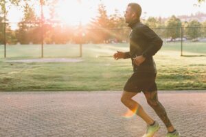 man running with energy from hormone therapy in Kansas City