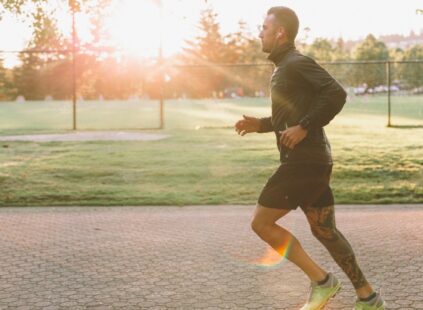 man running with energy from hormone therapy in Kansas City